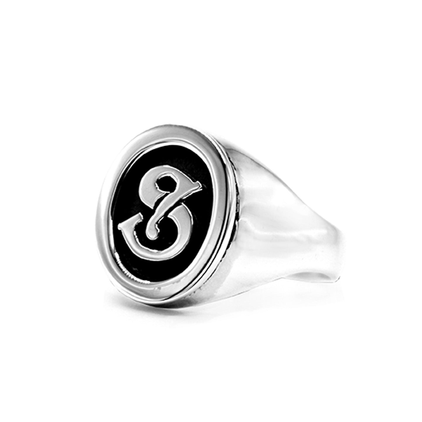 Handmade silver signet ring with an engraved initial. 