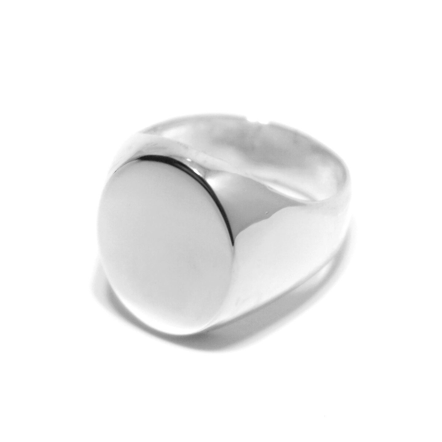 Oval Signet Sterling silver ring on a white background. 